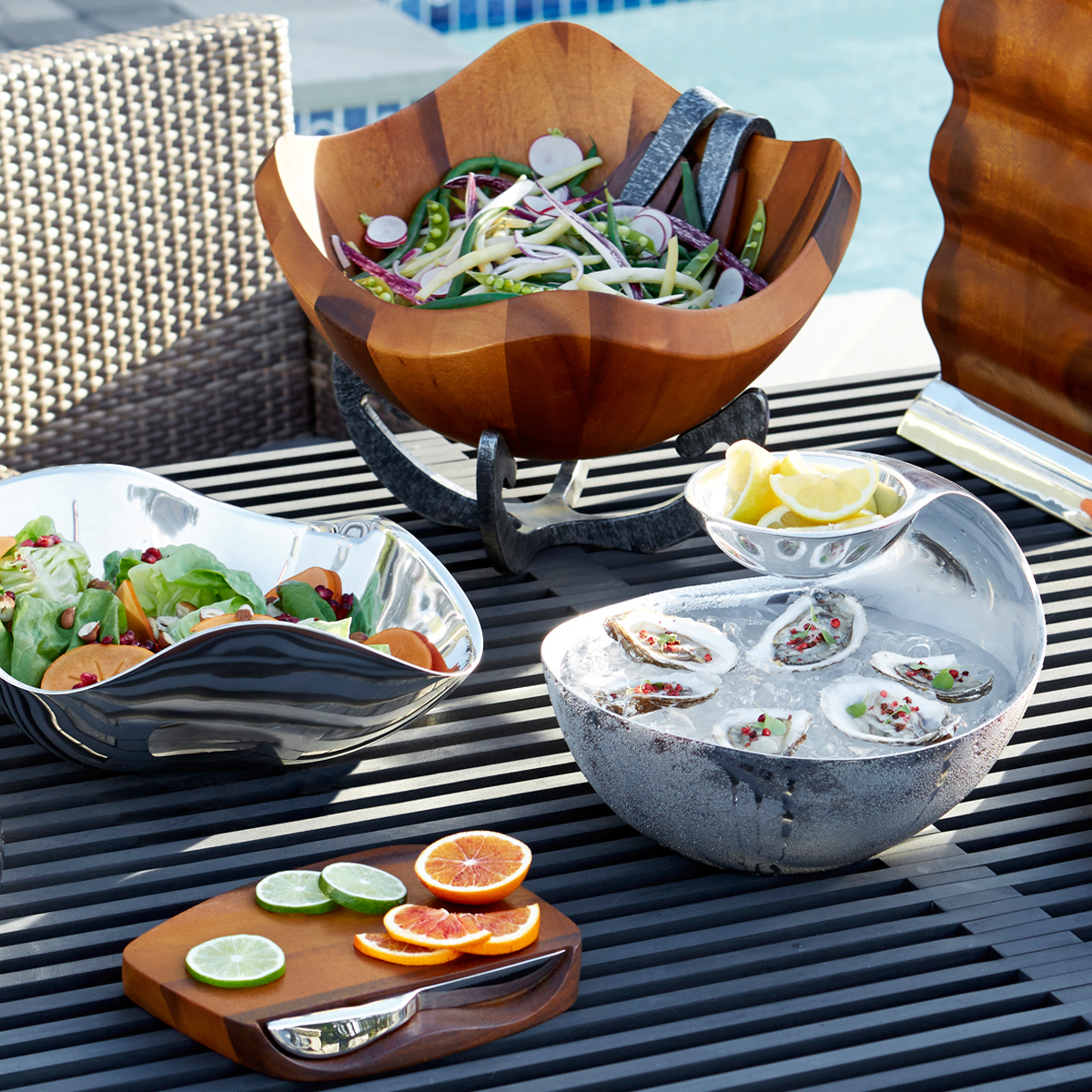 Nambé serveware and bowls — alloy and acacia entertaining essentials